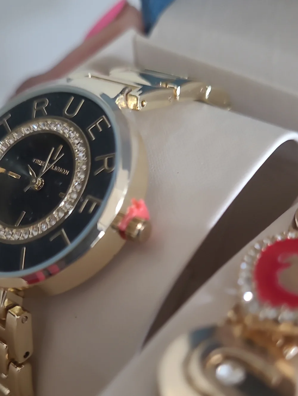 True Religion Gold-Tone Watch with Black Dial and Charm Bracelet